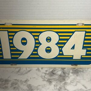 Vintage 1984 Blue and Yellow License Plate
